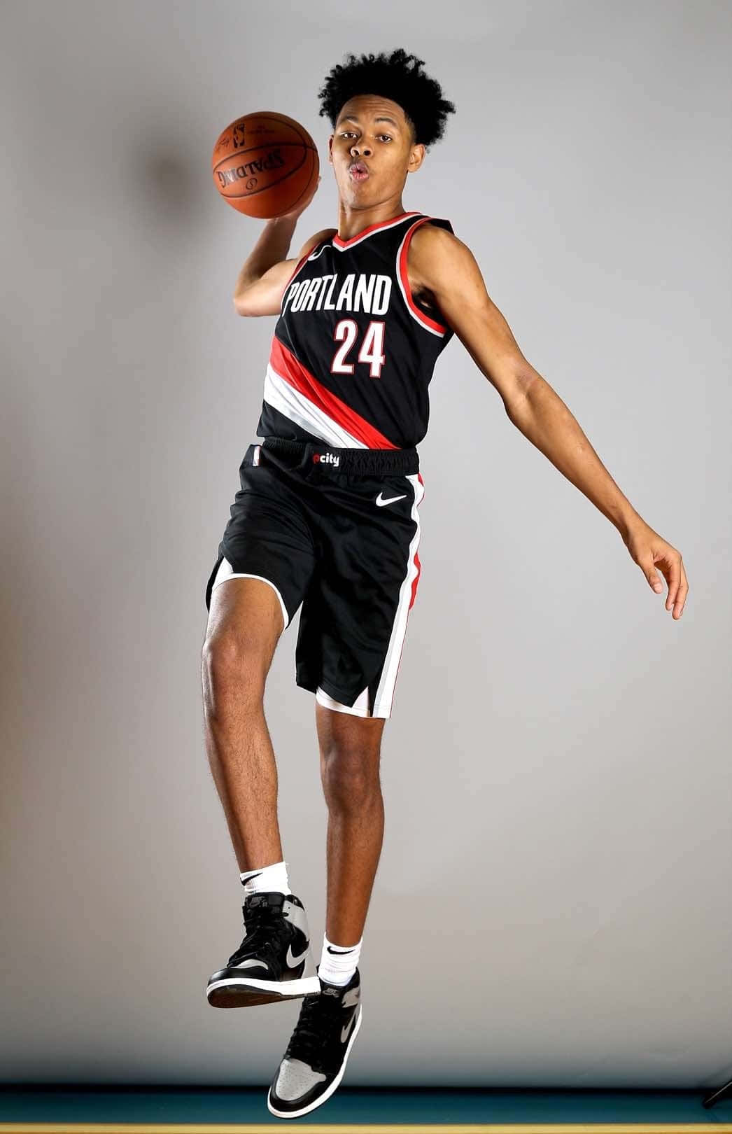 Portland Basketballer Mid Air Pose Achtergrond