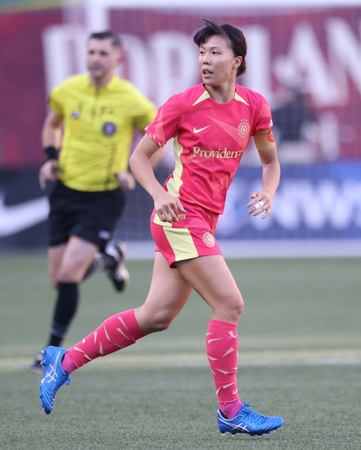 Portland Thorns Fc Speler In Actie.jpg Achtergrond