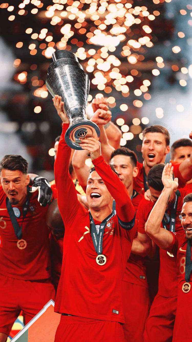 Portugal National Football Team Celebrates With Silver Trophy Wallpaper