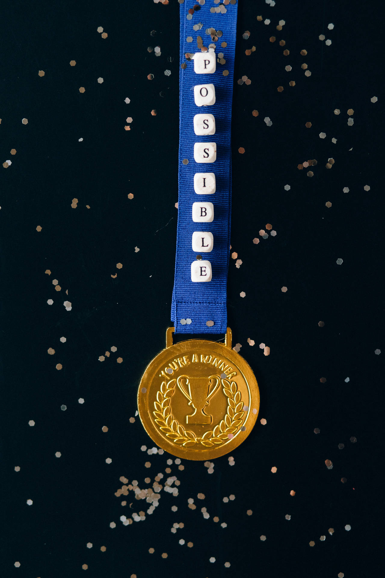 Possible Medal Black And Gold Iphone Wallpaper