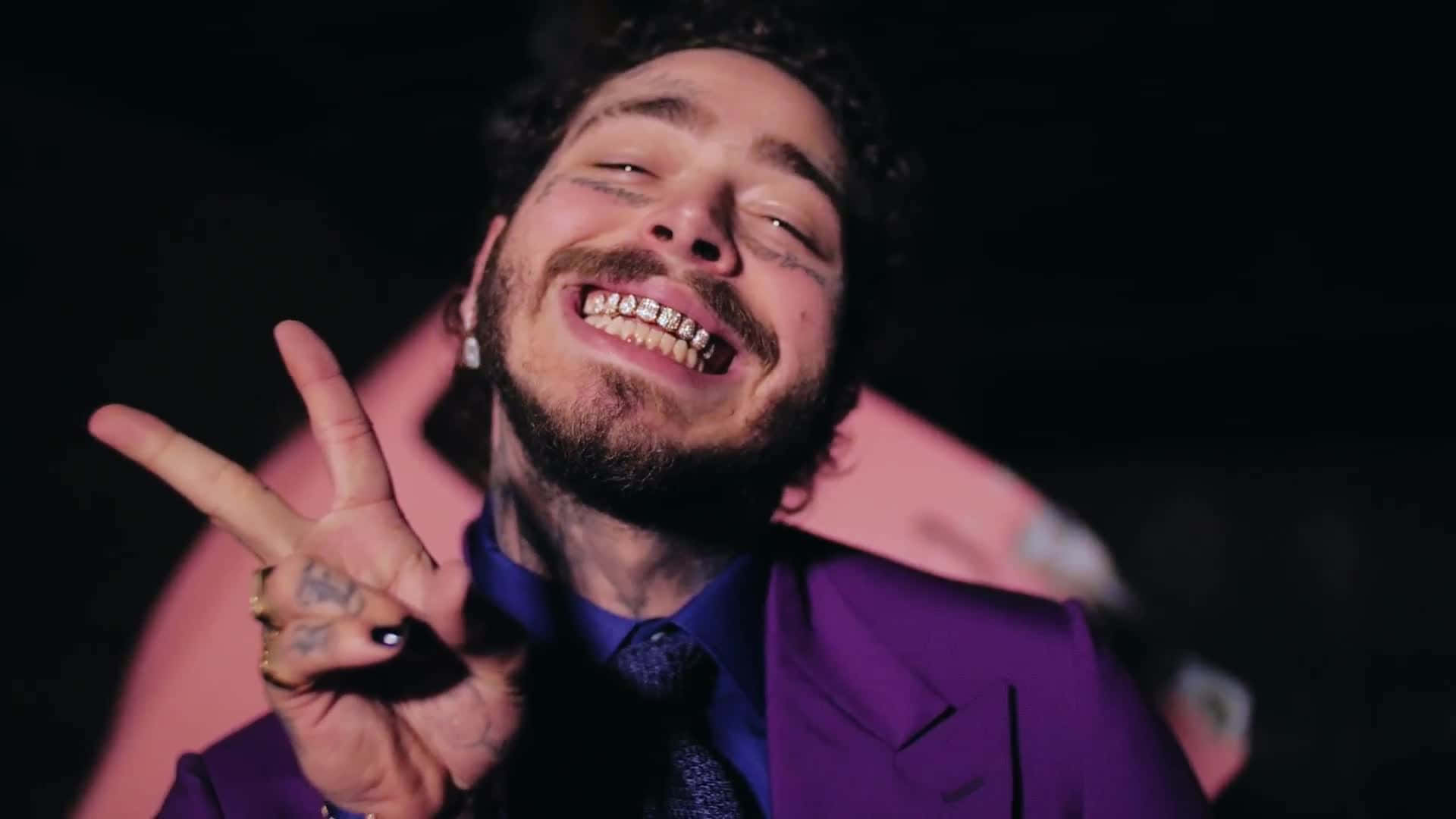 Post Malone exudes musical success in his iconic outfit