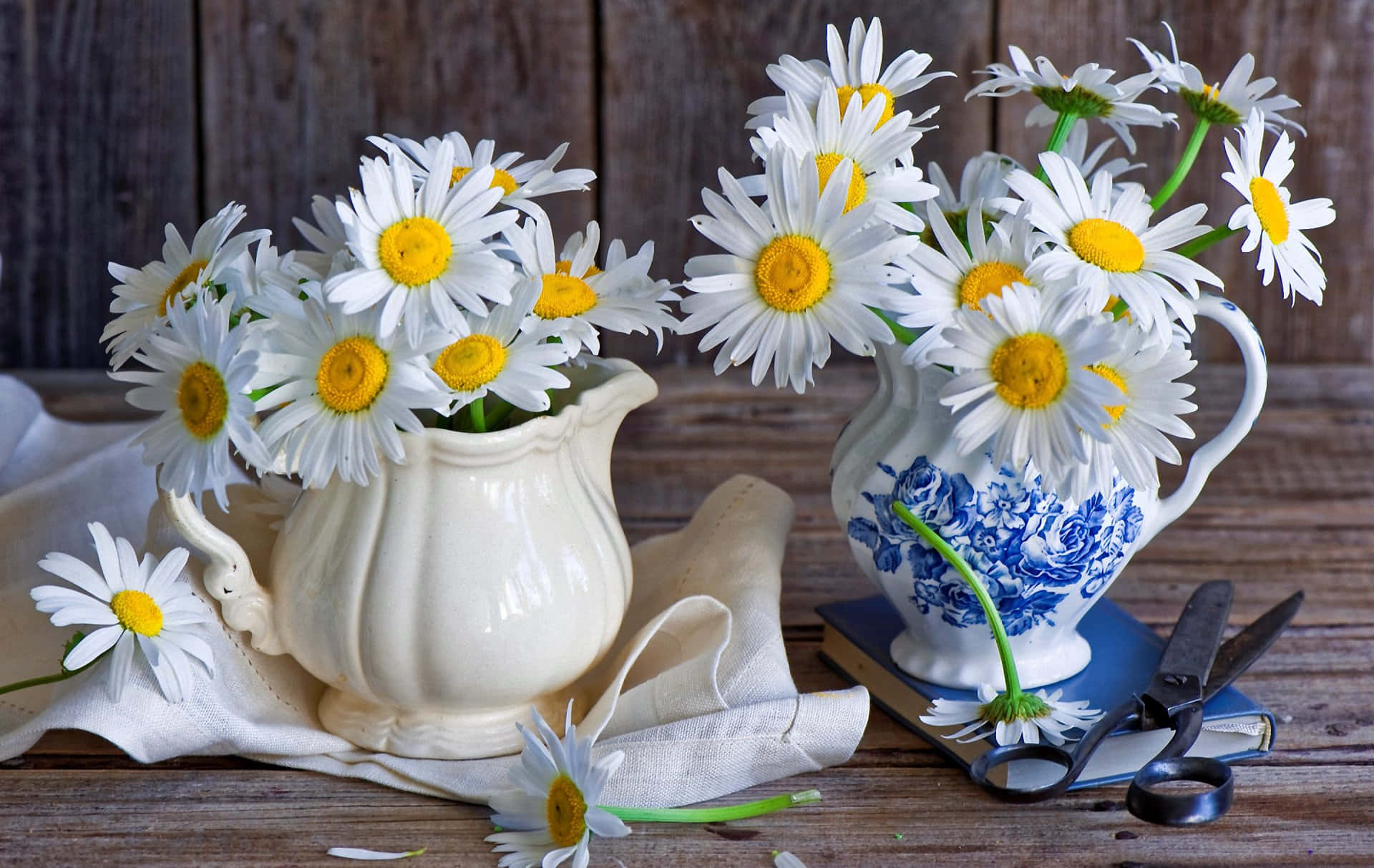 A White Vase With Daisies