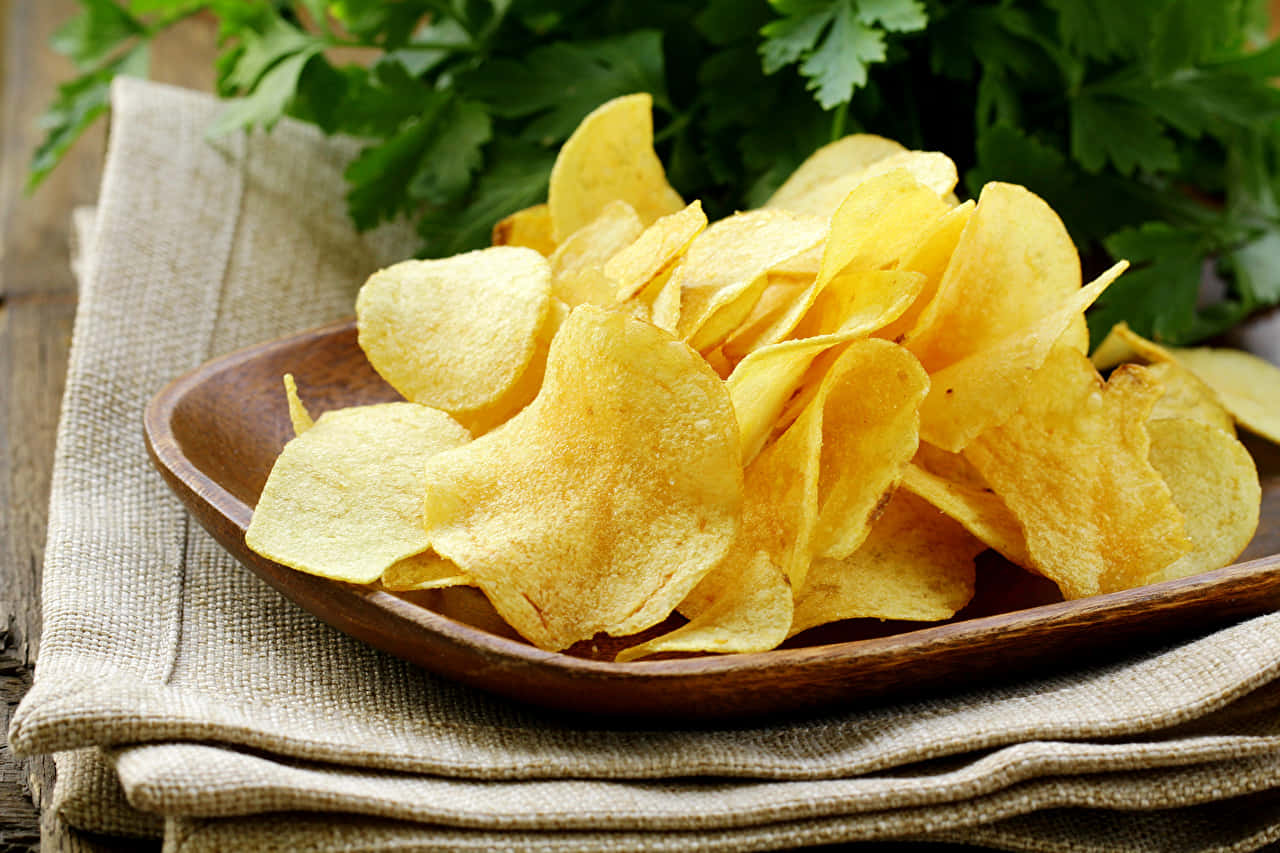 Potato Chips In Brown Plate Wallpaper