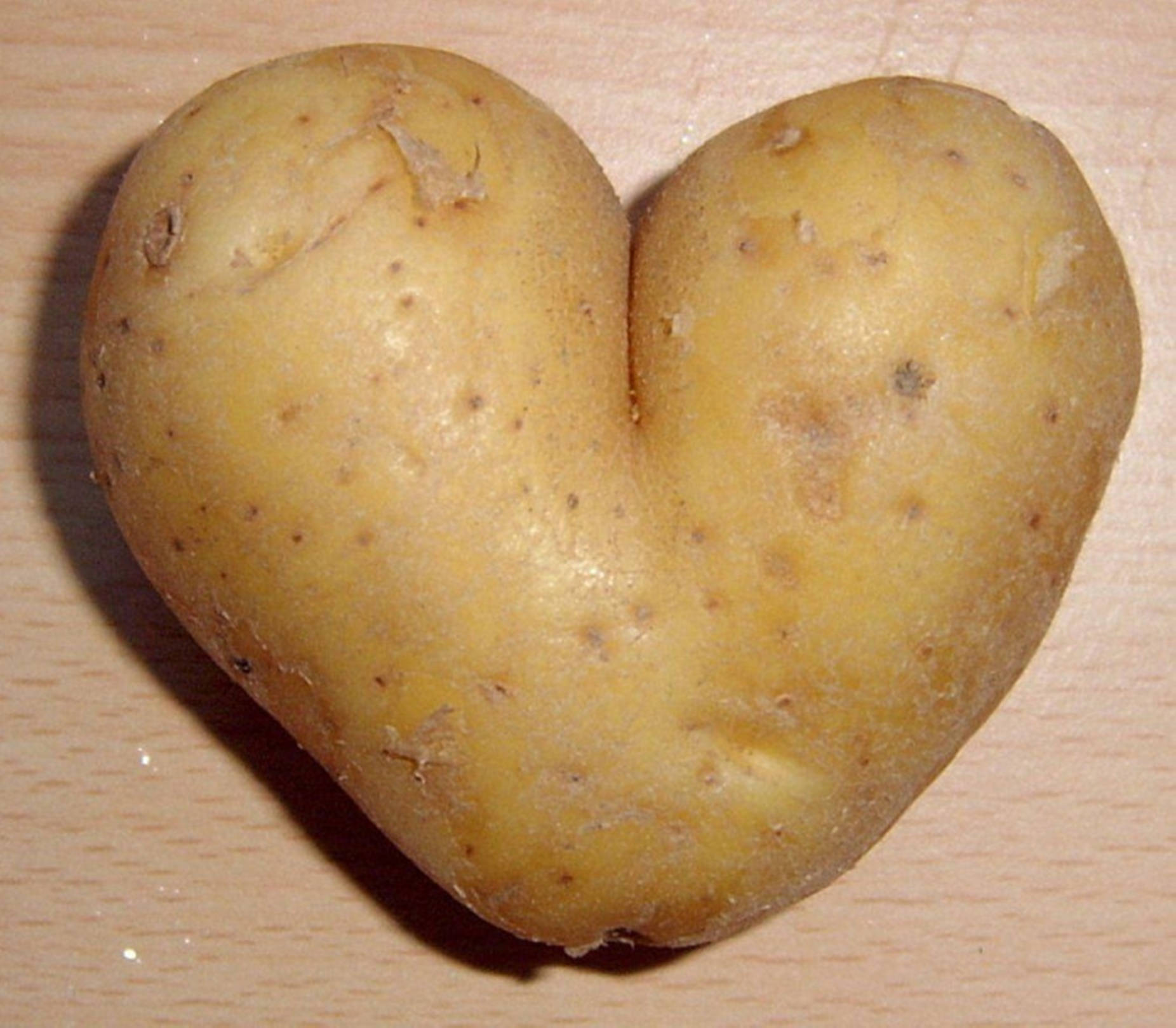 Patataen Forma De Corazón Encantador. Fondo de pantalla