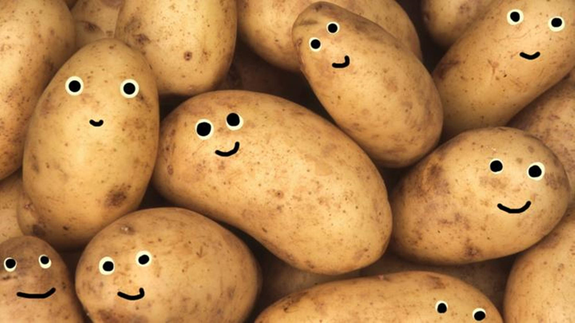 Potatoes Doodled With Goggly Eyes Wallpaper