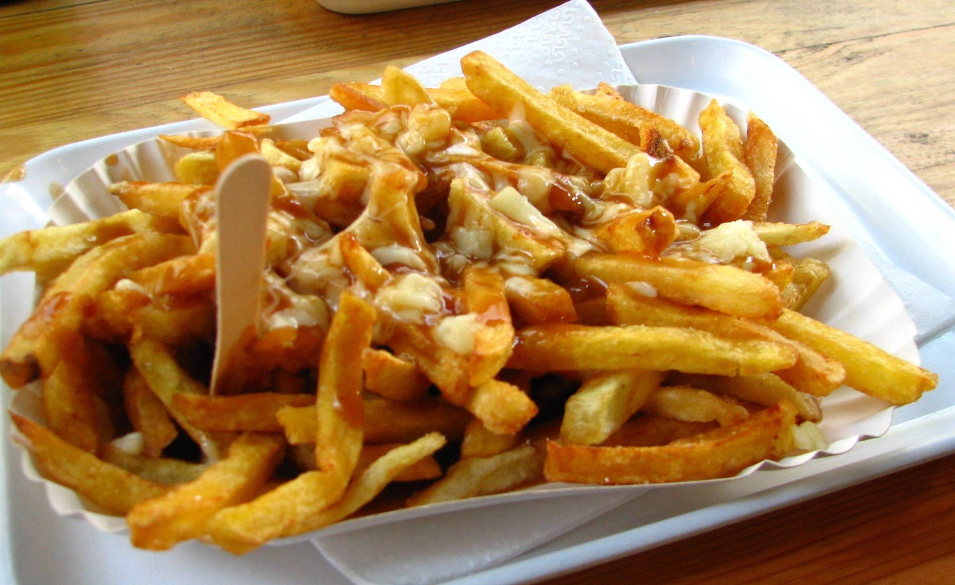 Poutine Fries Dish On Paper Plate Wallpaper