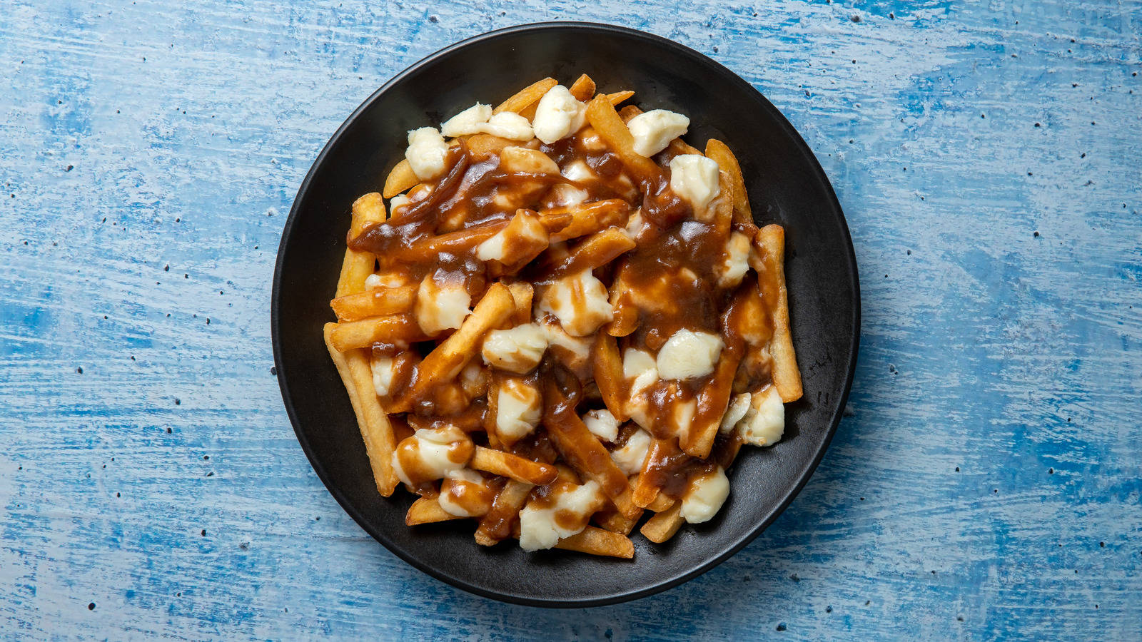 "A Delicious Plate of Canadian Poutine" Wallpaper