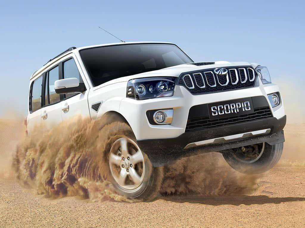 Power And Style Embodied – Mahindra Scorpio In Action Wallpaper