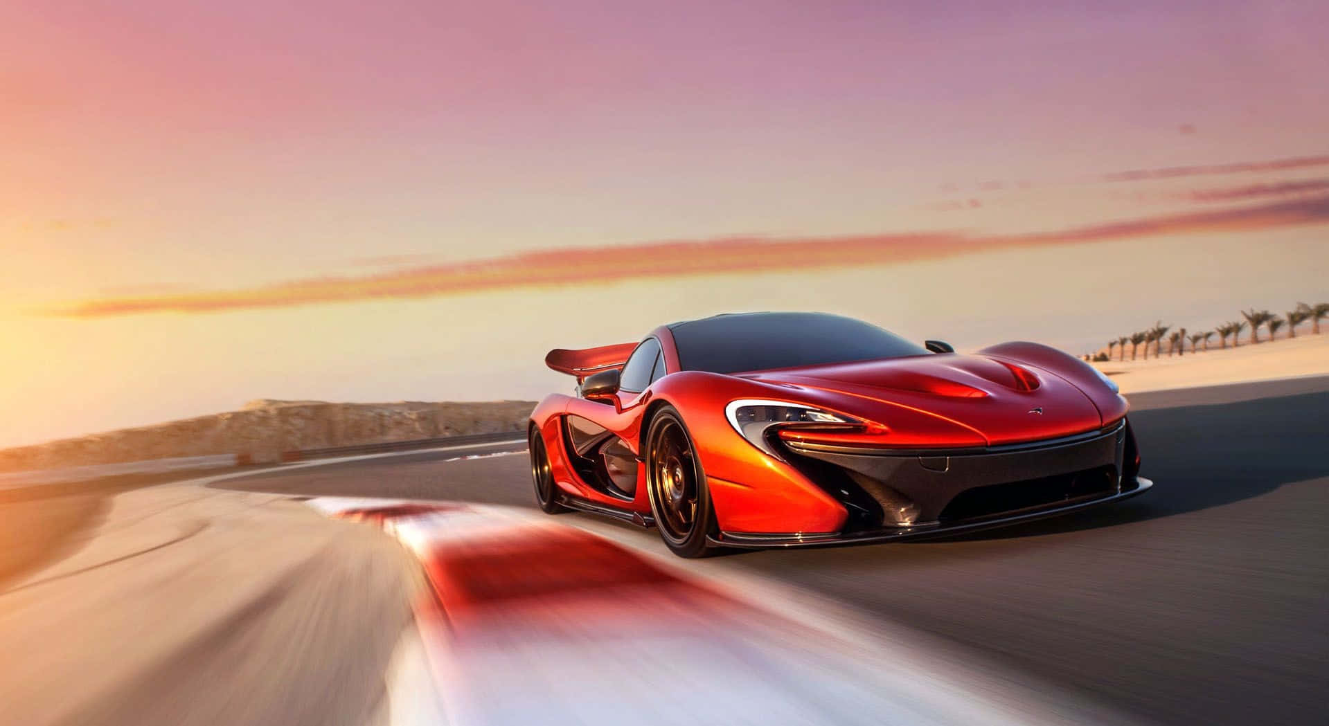 Power Unleashed: Mclaren P1 Roaring In Its Full Glory Wallpaper