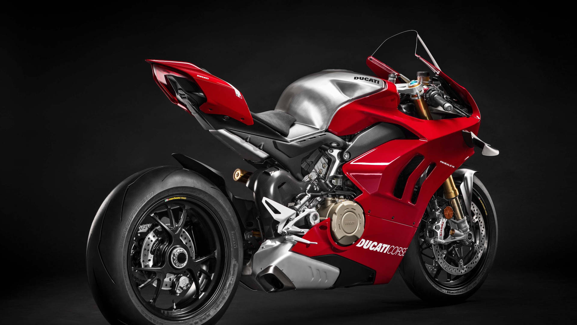 Powerful Ducati Motorbike In Action Wallpaper