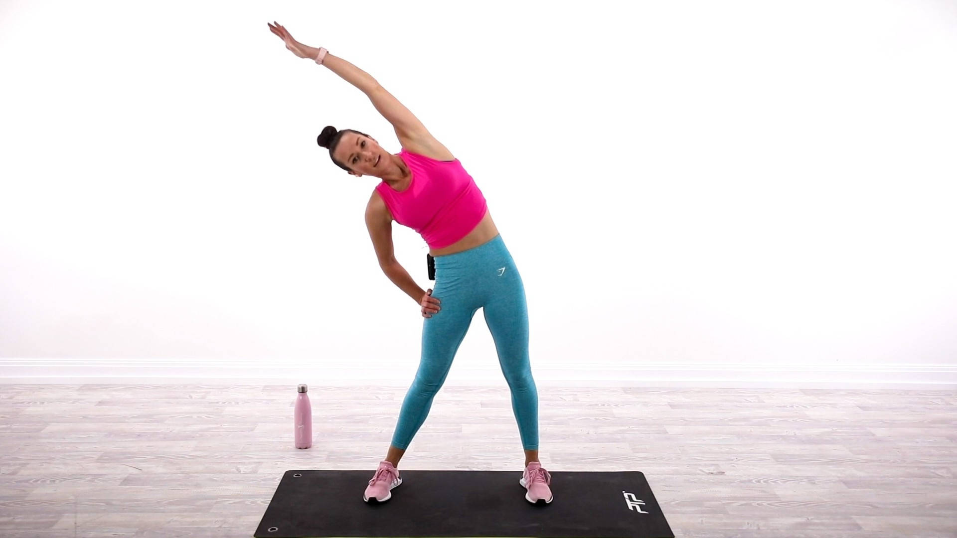 Powerful Lady Exercising Pilates Wallpaper