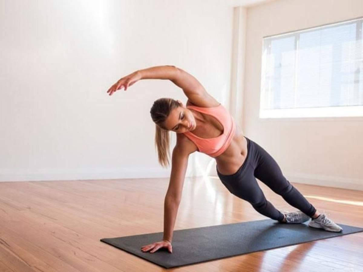 Powerful Lady Side Plank Pilates Wallpaper