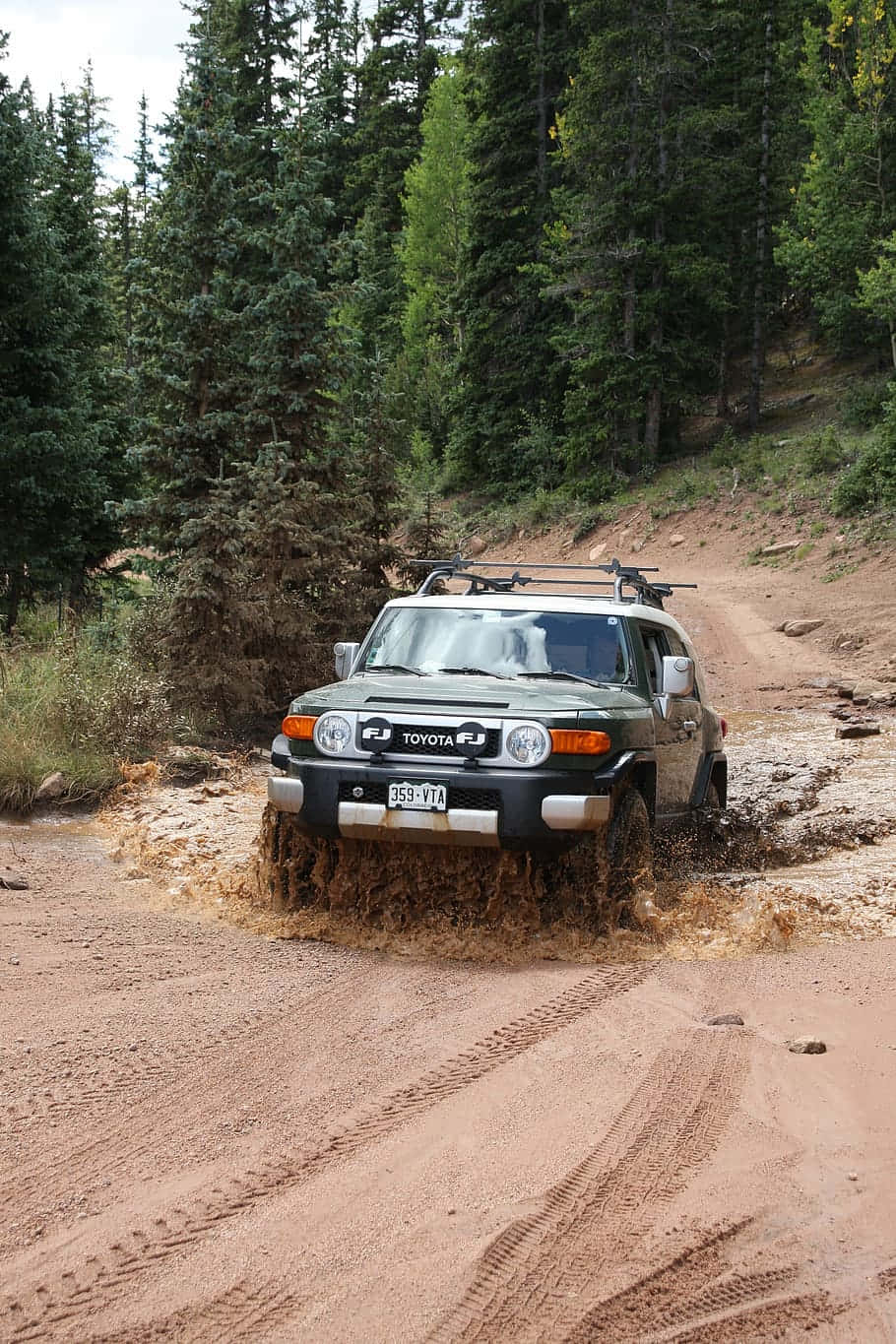 Powerful Toyota Land Cruiser Dominating The Landscape Wallpaper