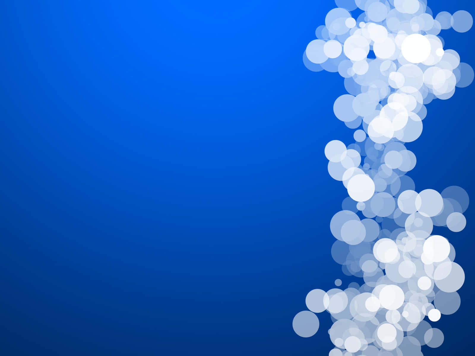 A Blue Background With White Bokeh Lights