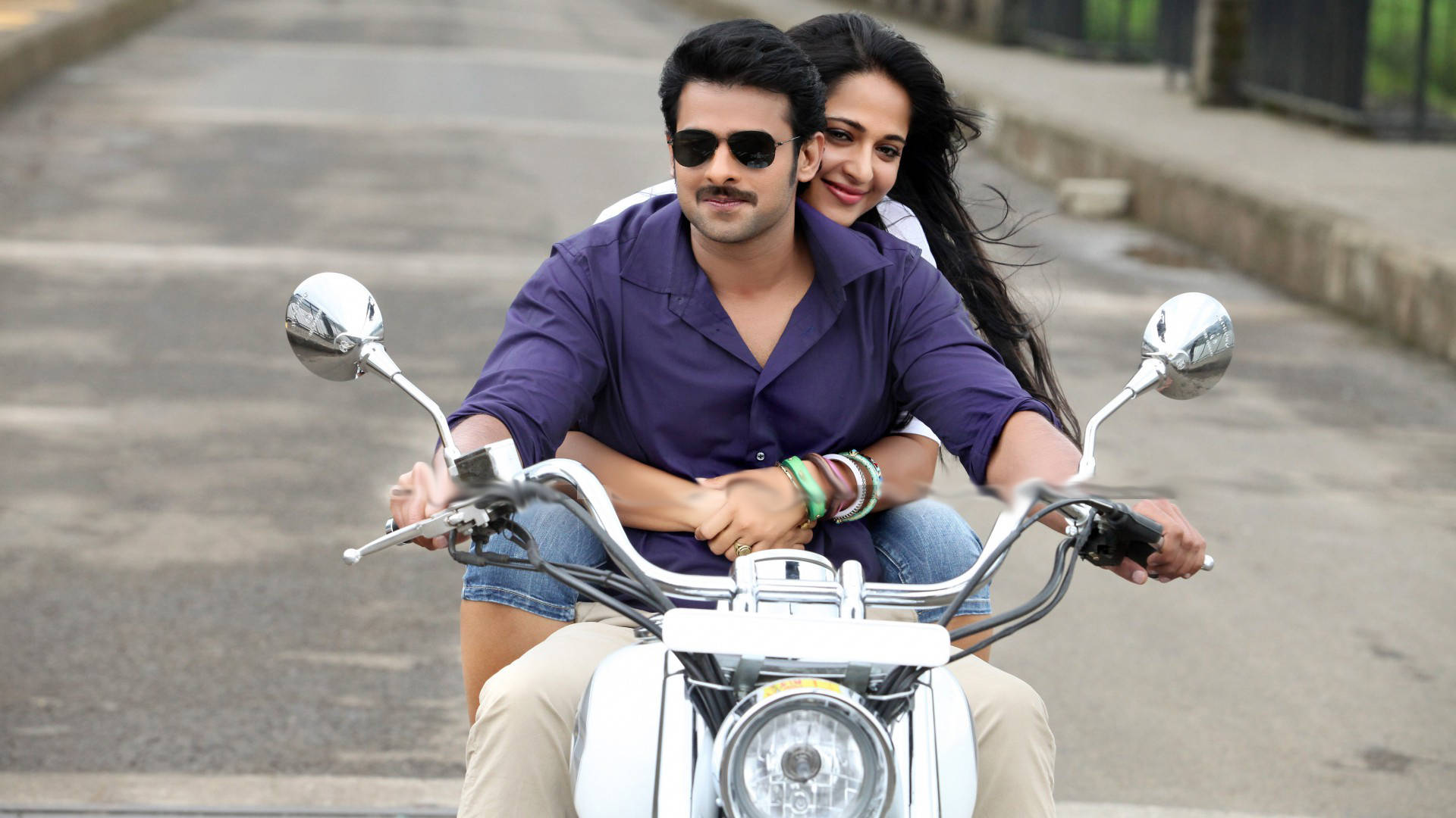 Download Prabhas Hd Driving With A Woman Wallpaper 