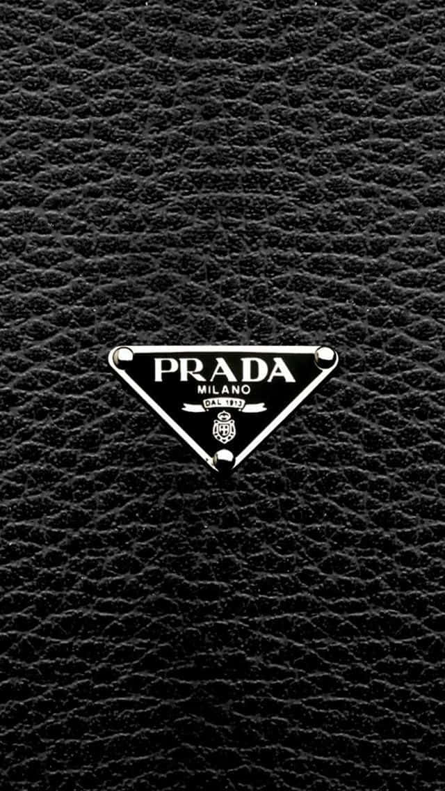 Prada Logo On A Black Leather Background
