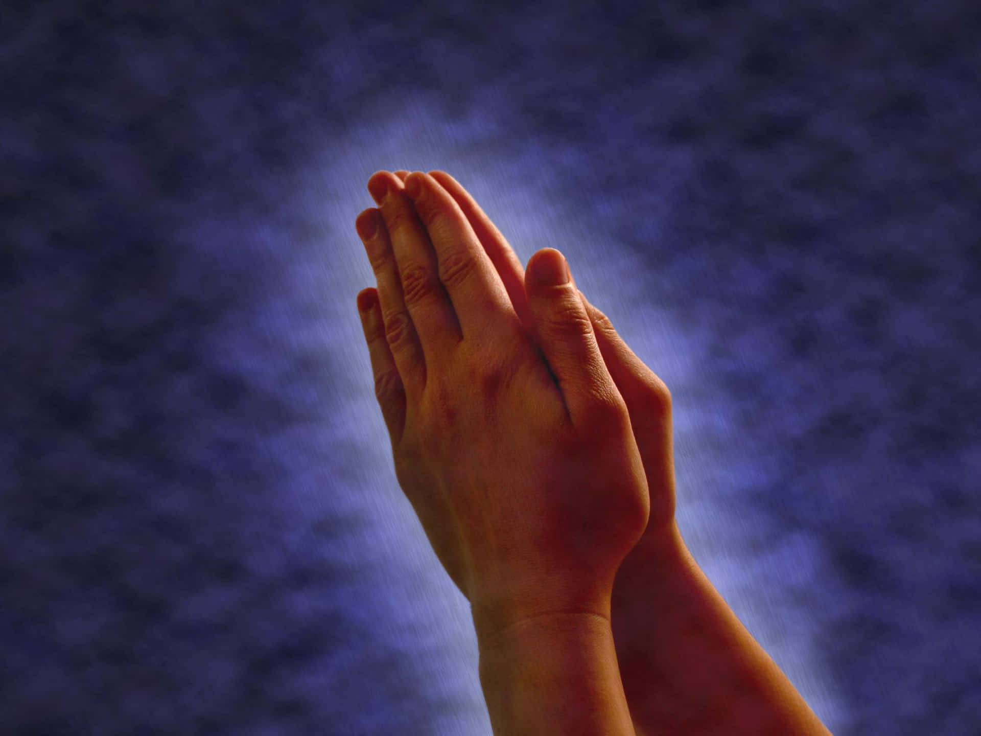 Umaimagem De Mãos Em Oração. Papel de Parede
