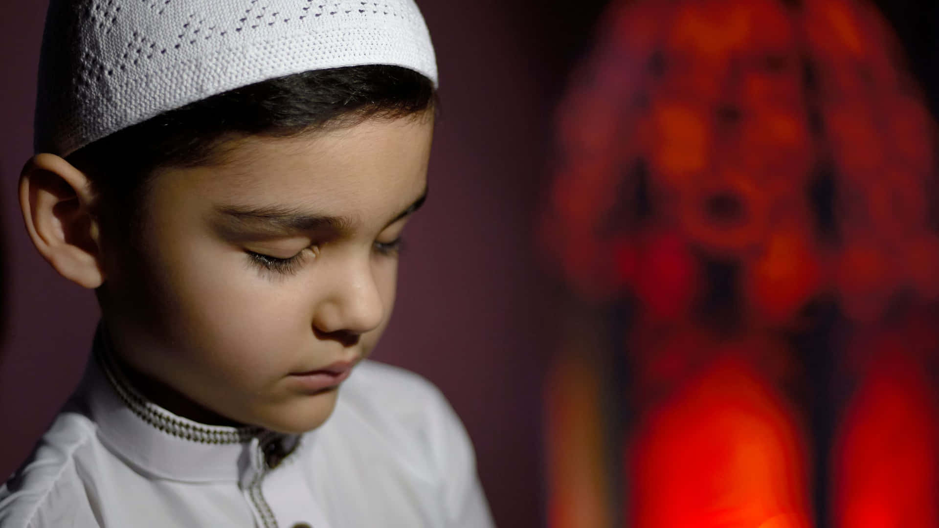 Young Muslim Boy in Prayer Wallpaper