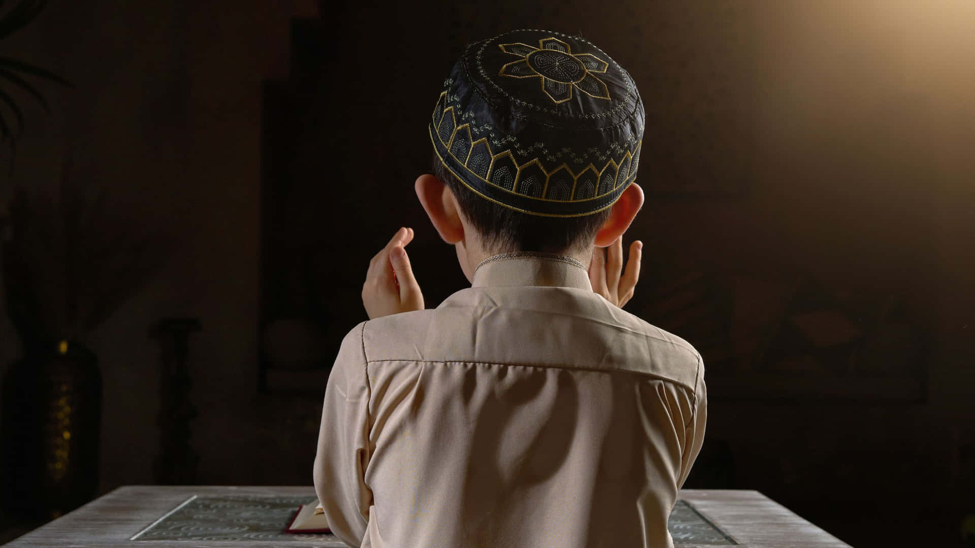 Praying Muslim Boy Dark Room Setting Wallpaper