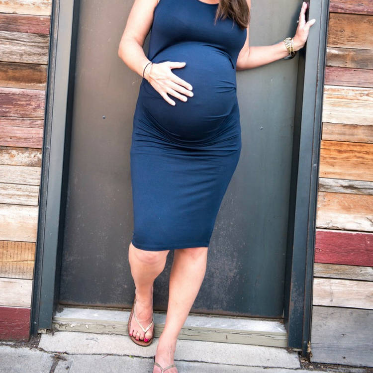 Pregnant Belly Blue Dress Doorway Wallpaper