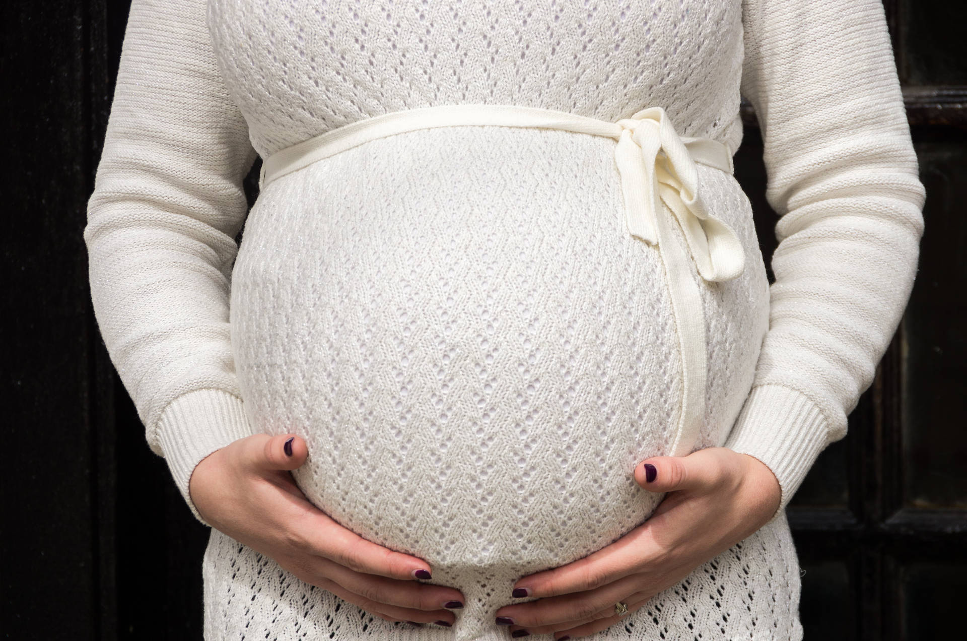 Pregnant In Knitted Dress Wallpaper