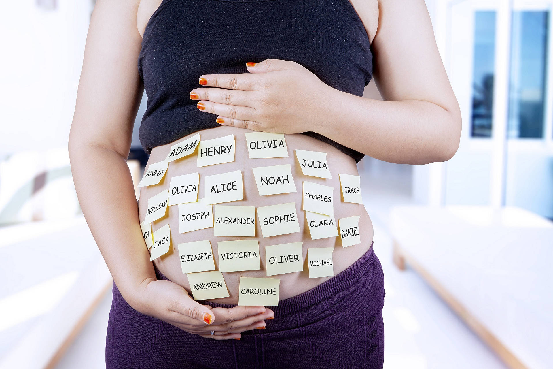 Pregnant Tummy With Baby Names Wallpaper