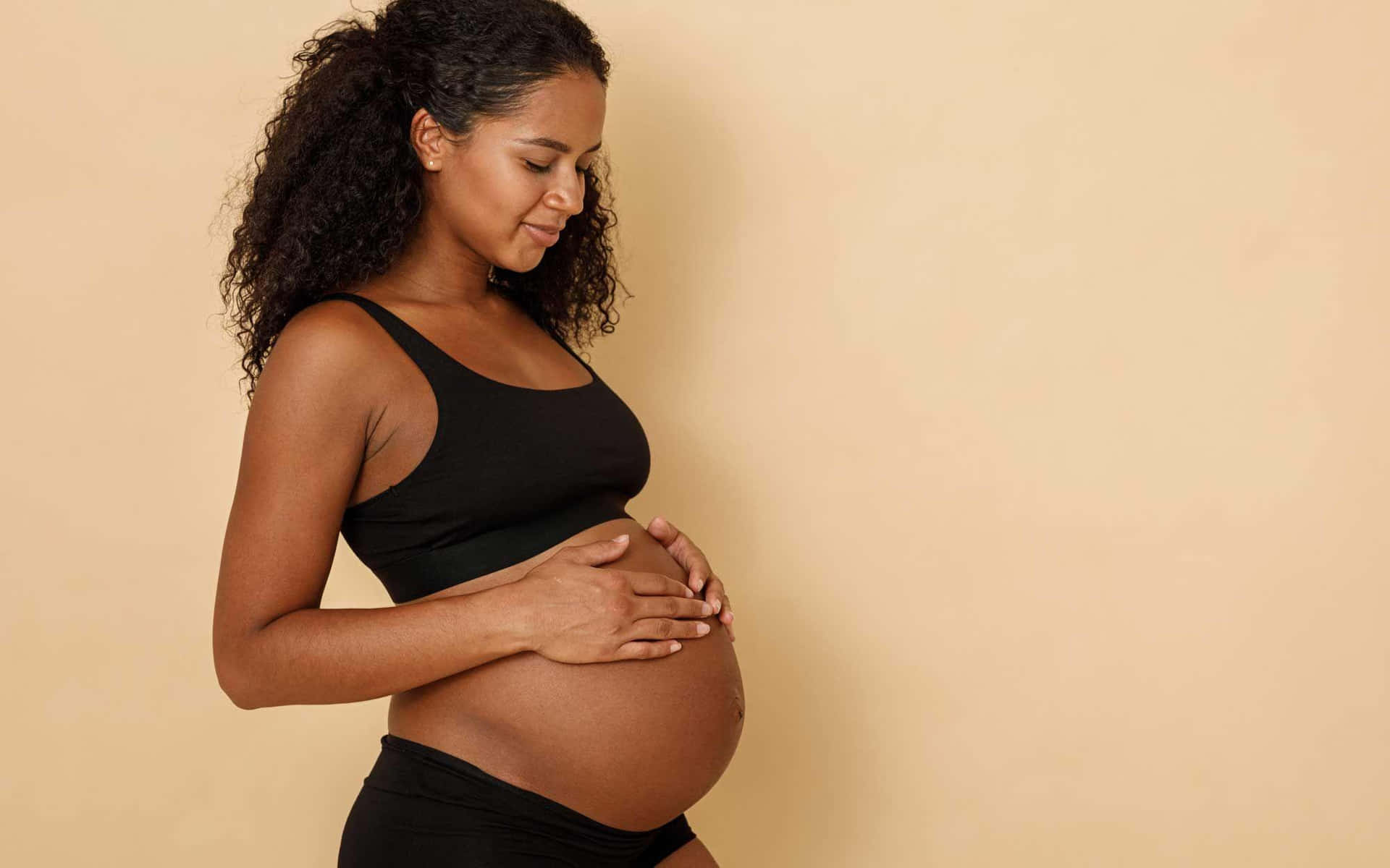 Pregnant Woman Baby Bump Shot Wallpaper