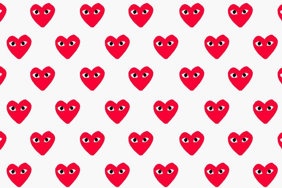 Red Hearts With Eyes On A White Background Wallpaper