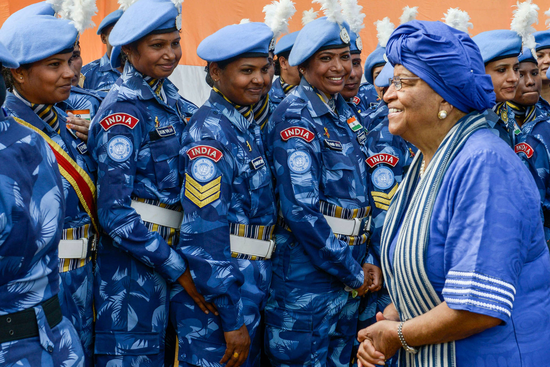 President With Female Indian Police
