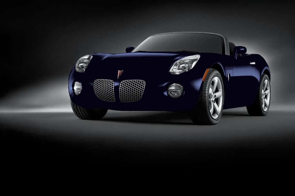 Prestigious Pontiac Solstice Amidst Nature Wallpaper