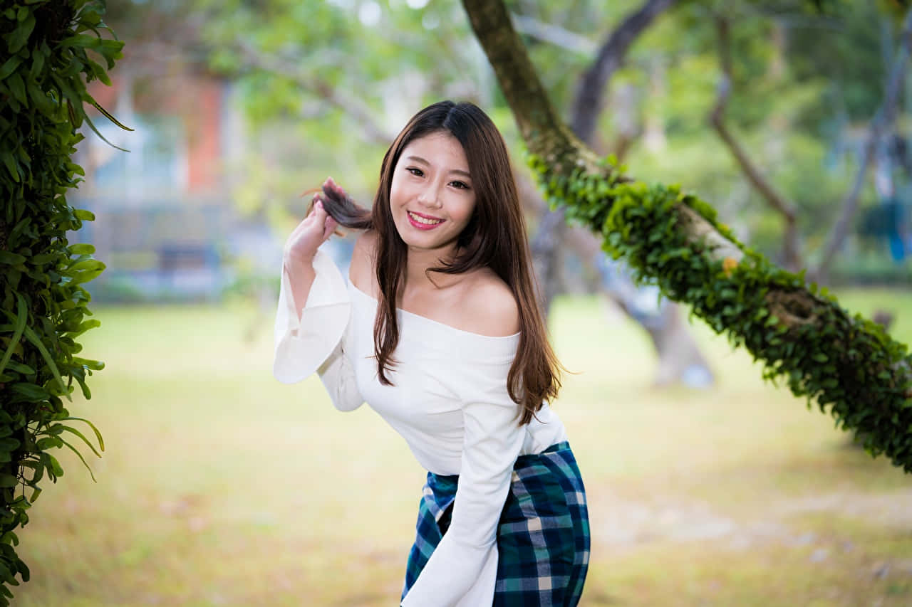Pretty Asian In Park Wallpaper