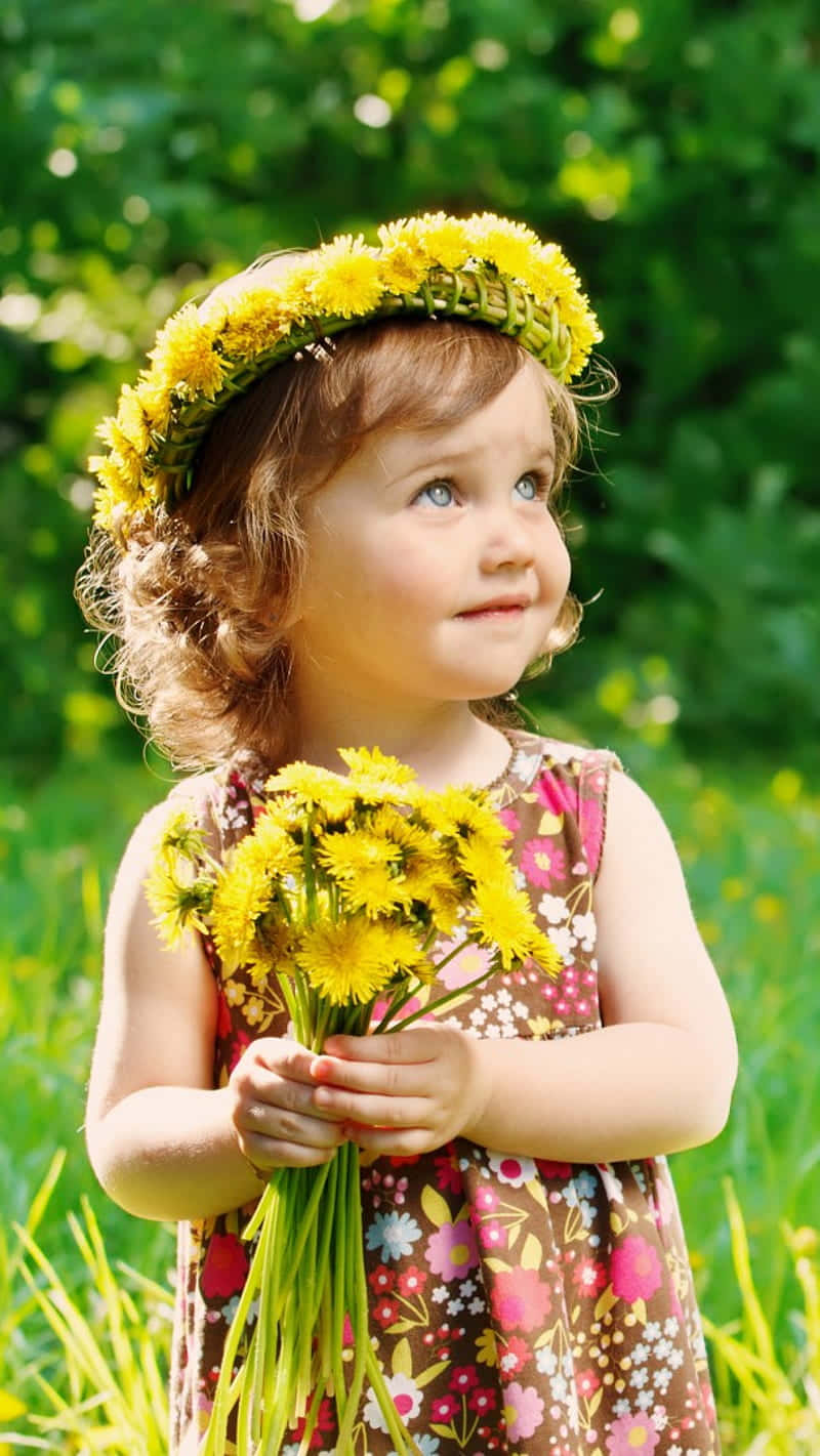 Pretty Baby Girl With Yellow Flower Crown Background
