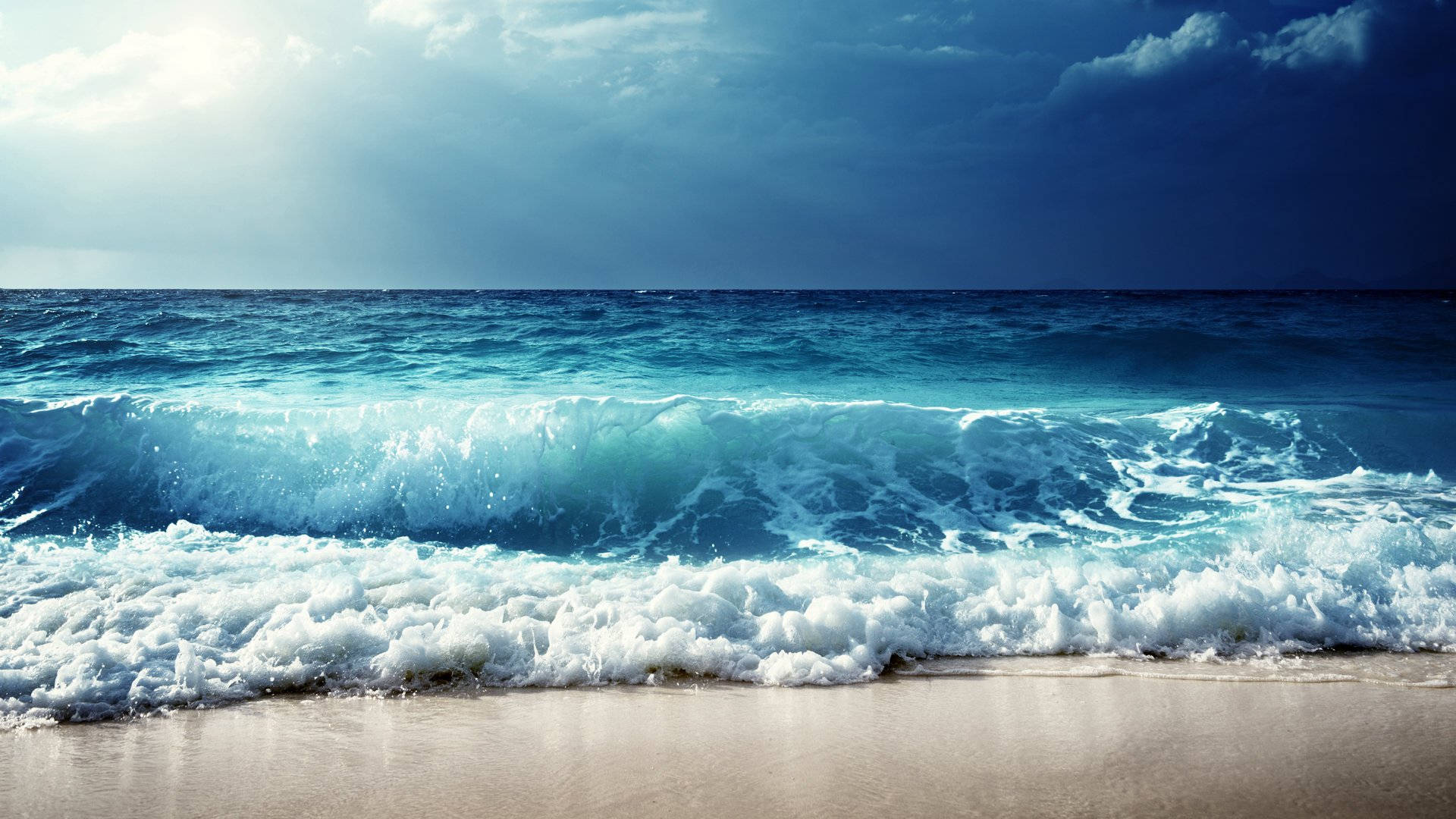 Pretty Blue Sea Waves By The Beach Wallpaper