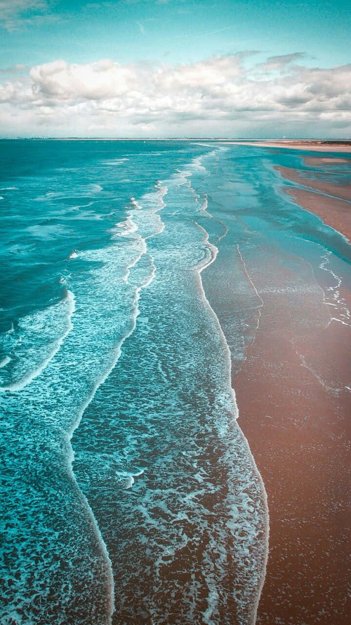 Pretty Ocean With Lines Of Waves Wallpaper