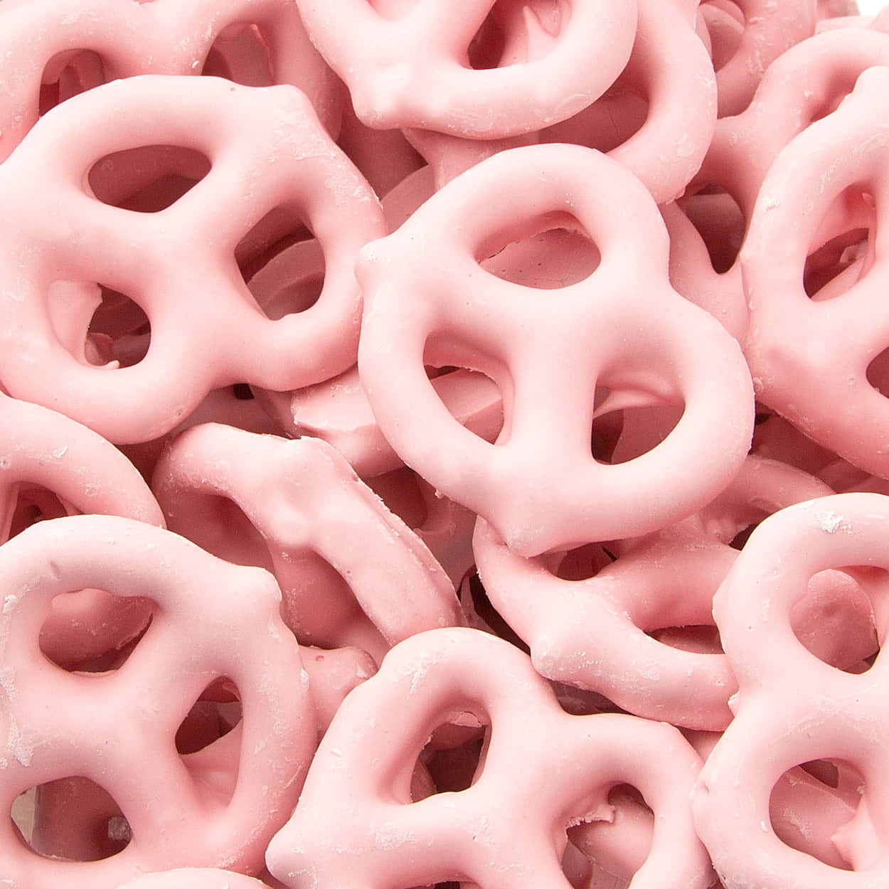 Pink Pretzels On A White Surface