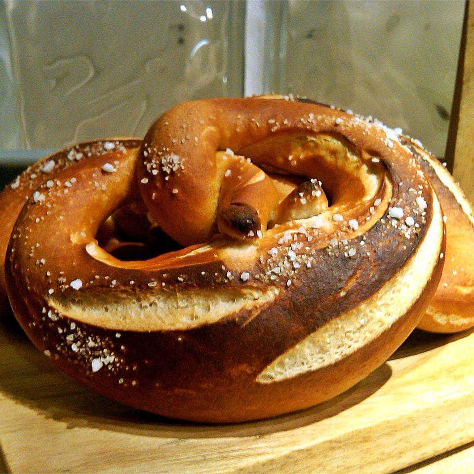 A Wooden Board With Pretzels