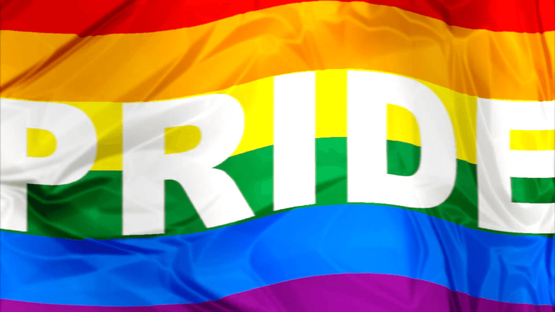 Vibrant Pride Flag with Inspiring Word Art Wallpaper