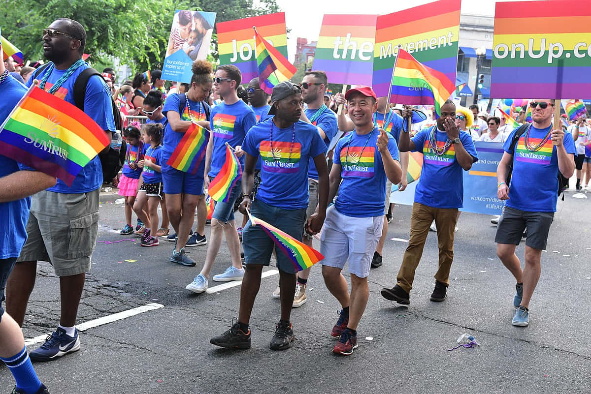 Men Parading Blue Pride Shirts Picture