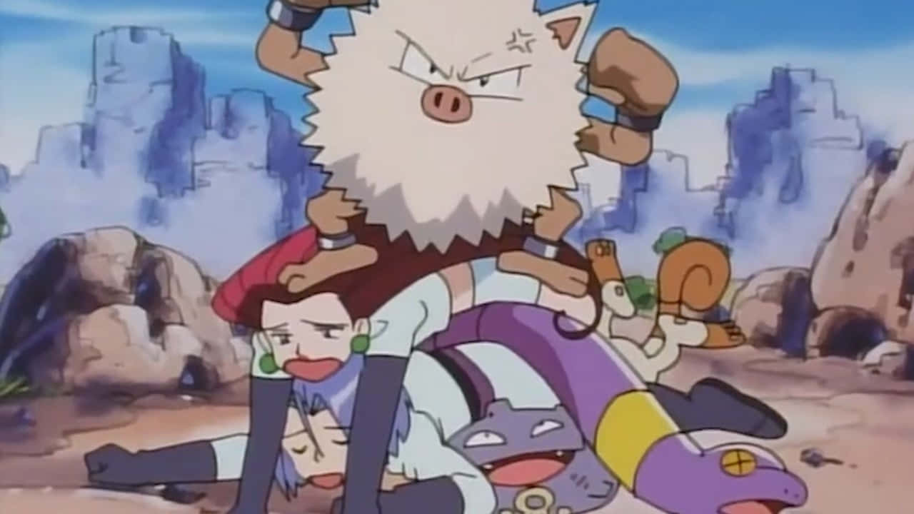 Primeape On With Team Rocket Wallpaper