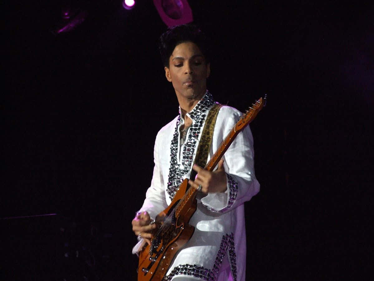 "The Legendary Prince In His Iconic Purple Rain Outfit"