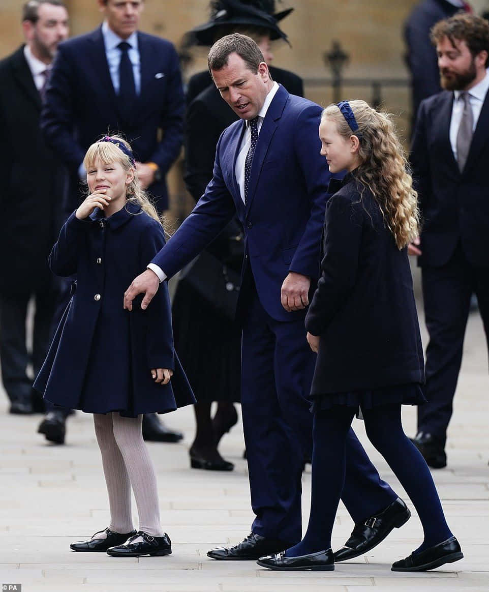 A Man And His Two Daughters Walk Down The Aisle
