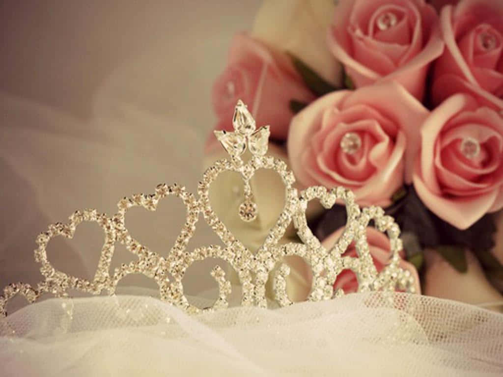 A Tiara Is Sitting On Top Of A White Table Wallpaper