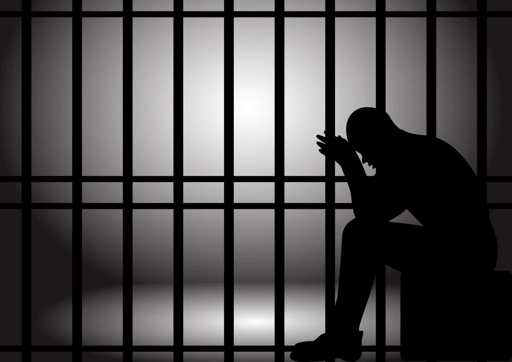 Silhouette Of A Man In Jail