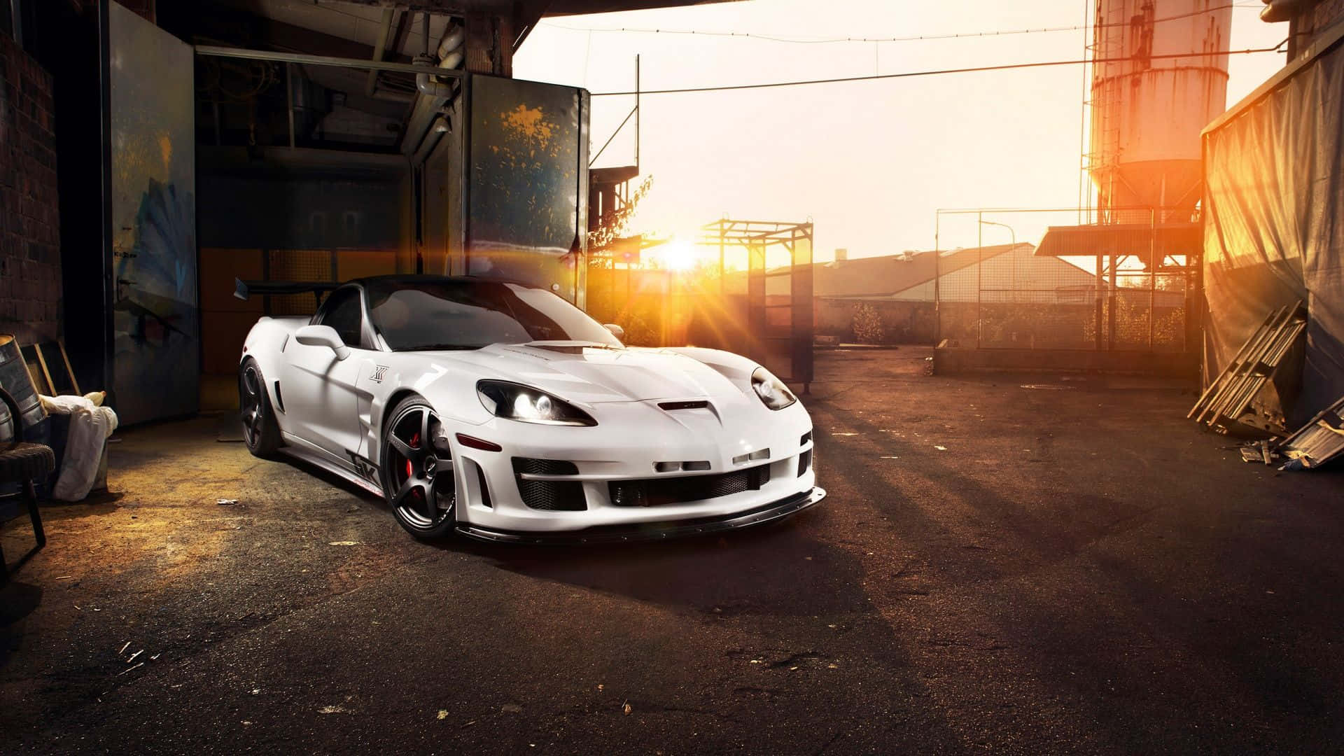 Pristine Chevrolet Corvette C6 On The Open Road Wallpaper