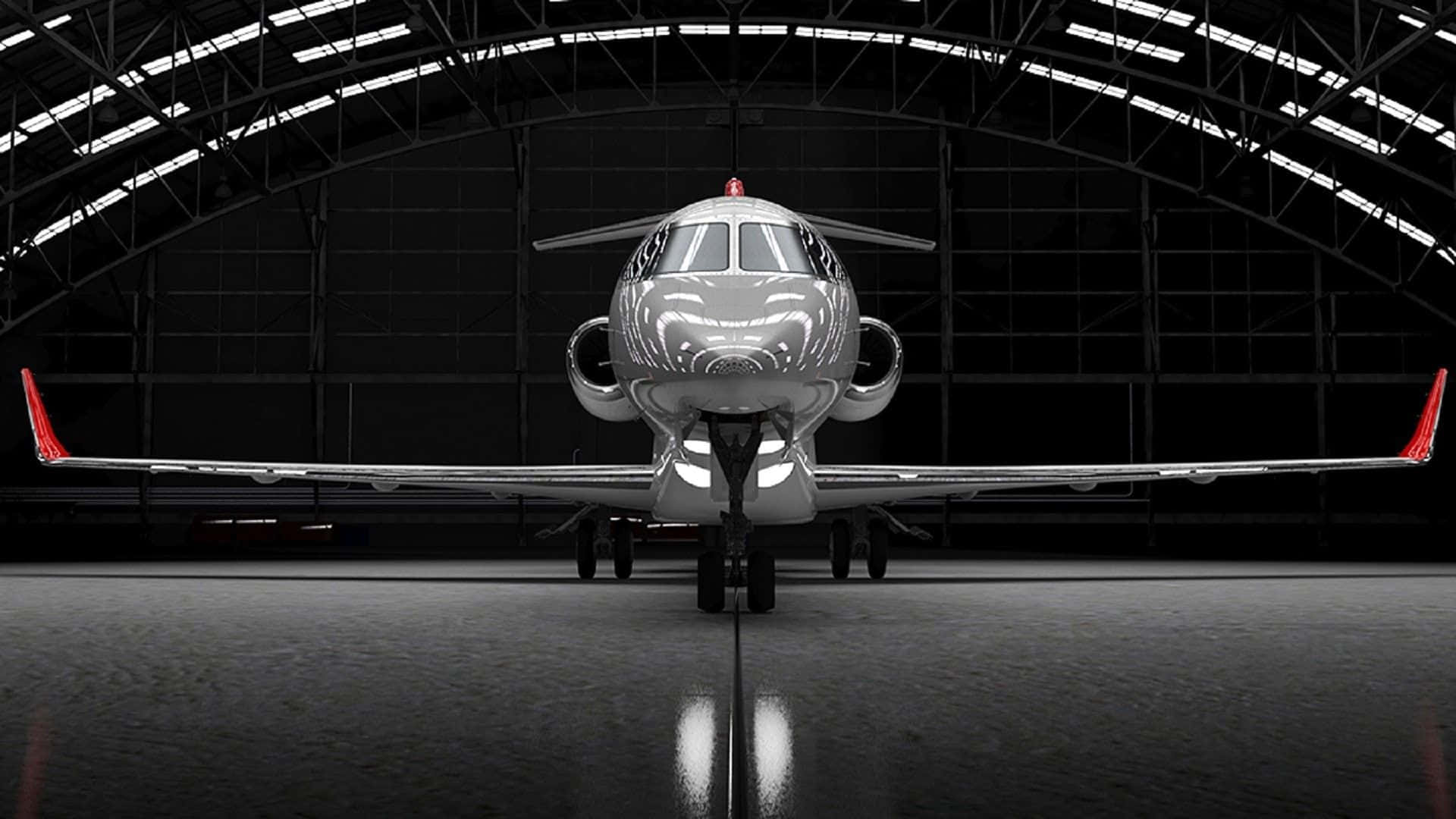 Private Jet In Hangar Wallpaper
