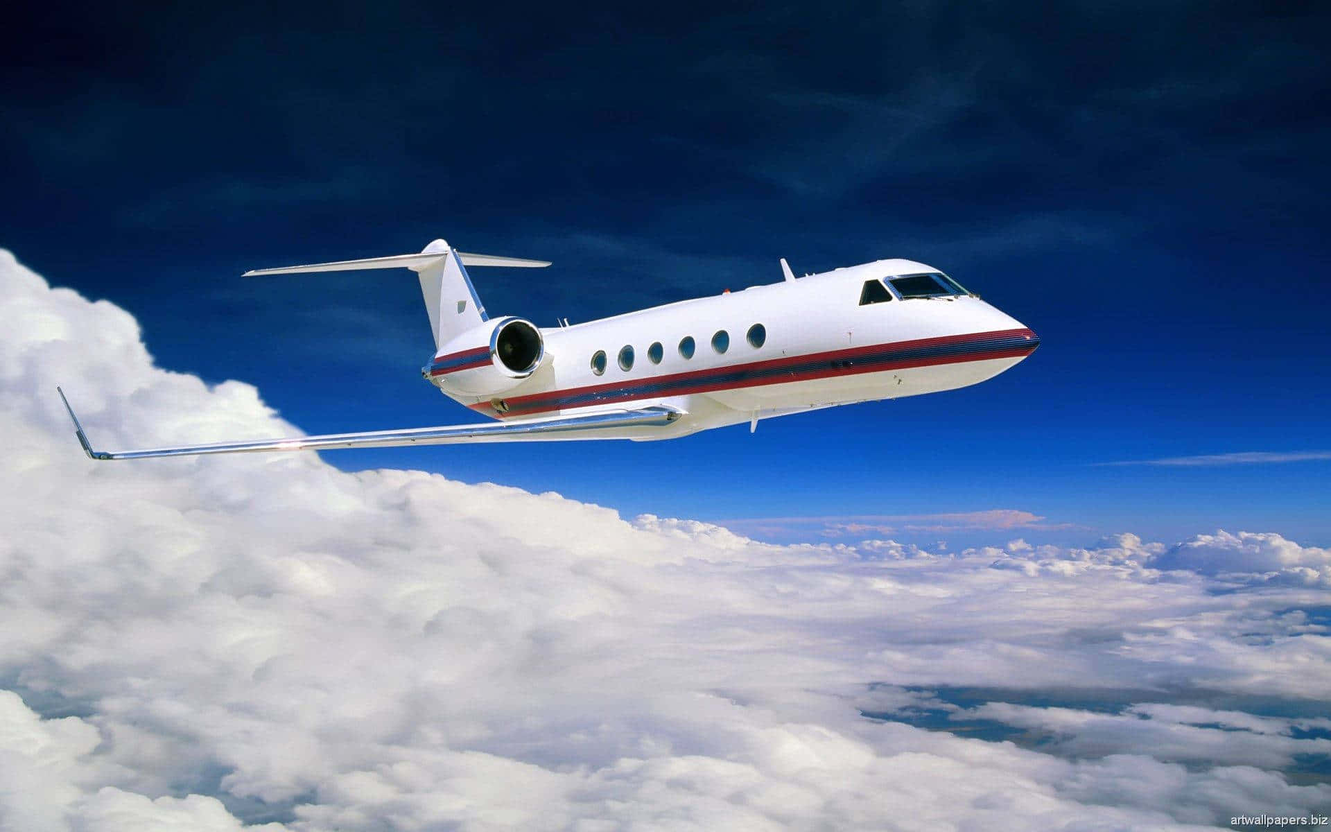 Private Jet Over Clouds Wallpaper