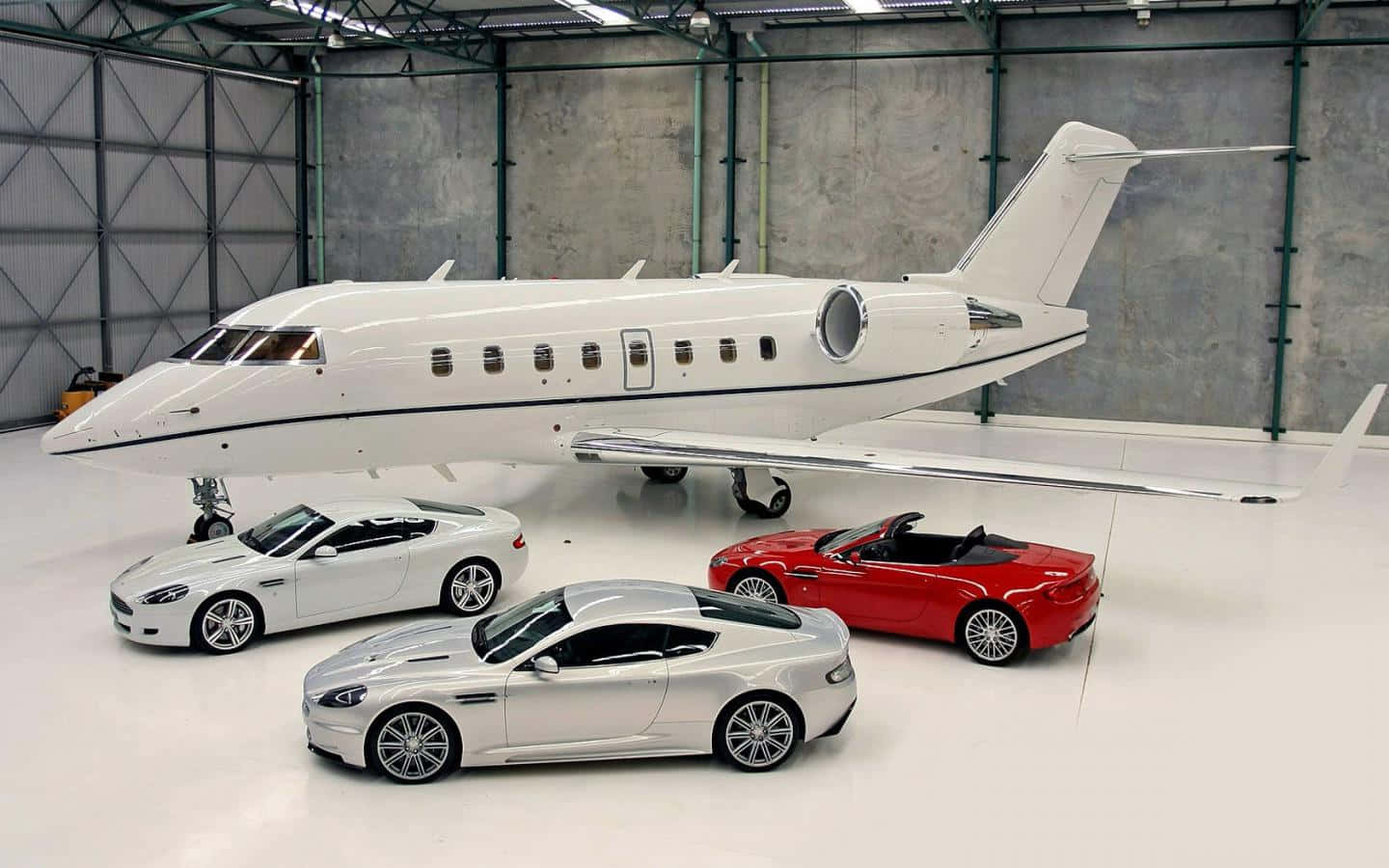 Private Jet With Luxury Cars Wallpaper