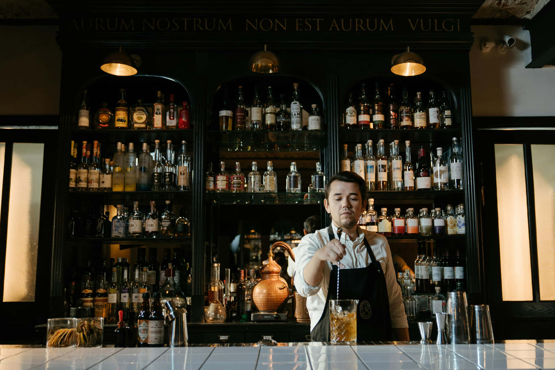 Professional Bartender Preparing Drink Wallpaper