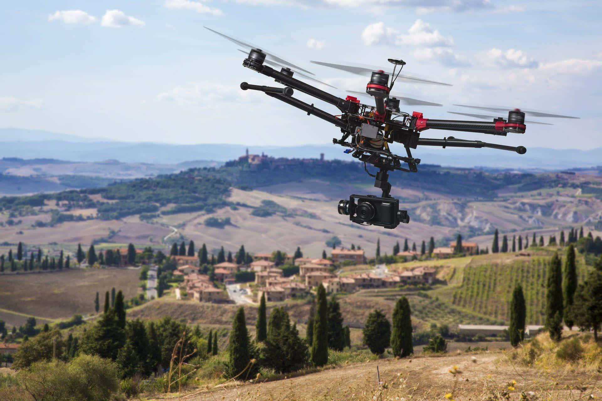 Professional Drone Camera Over Landscape Wallpaper