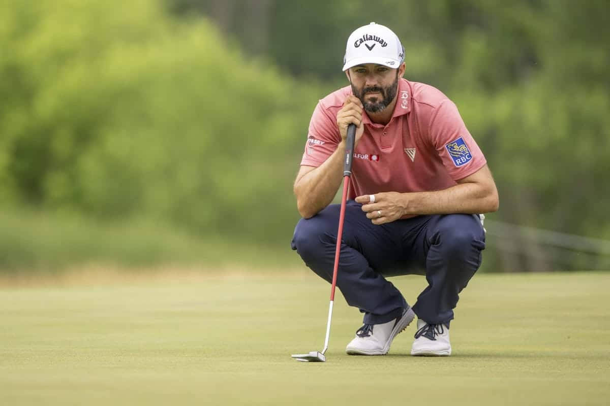 Professional Golfer Adam Hadwin In Action During A Golf Tournament Wallpaper